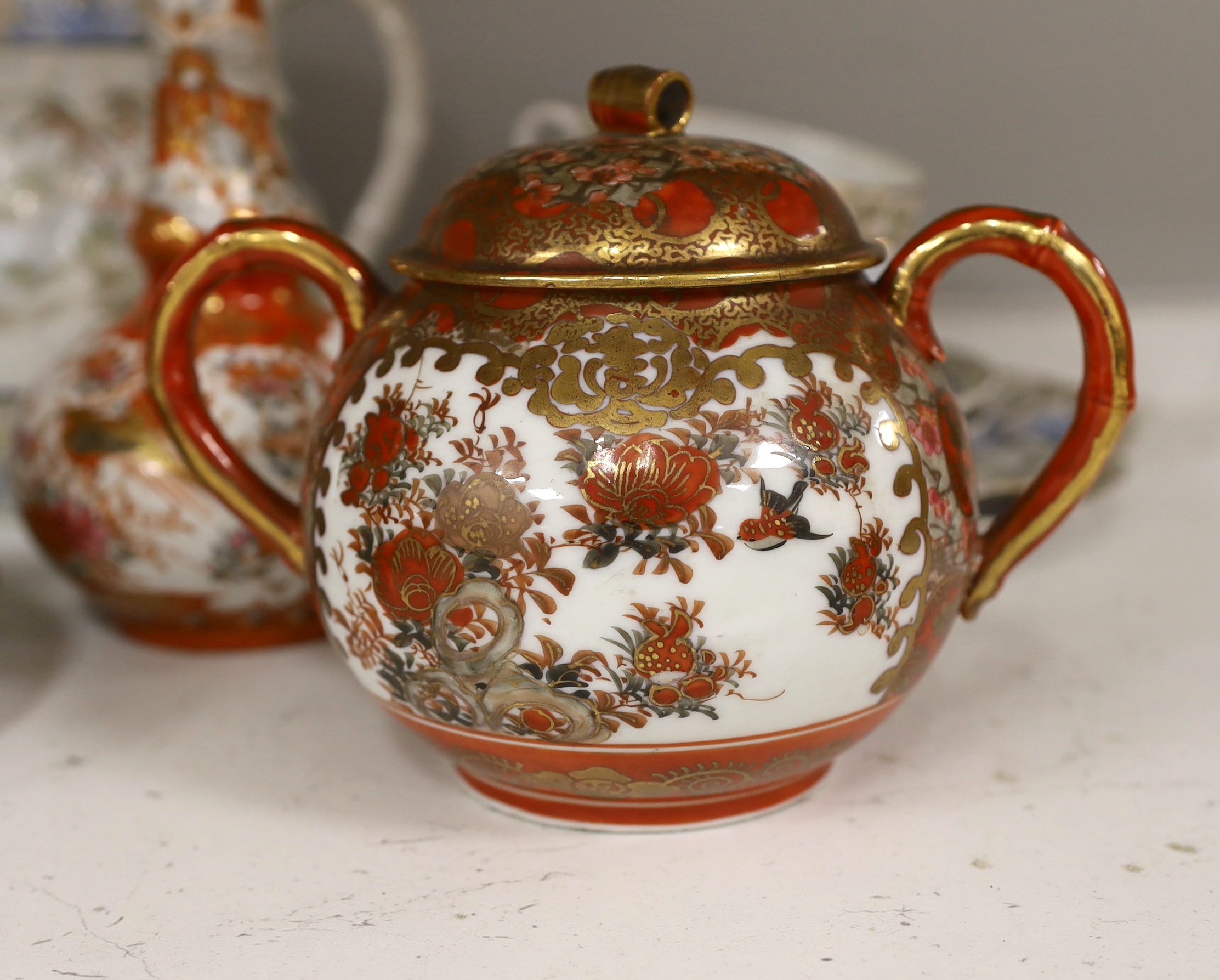 A group of Japanese ceramics, Meiji period, teapot (missing cover), jug, teacups, saucers, etc. (10)